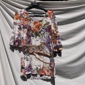 Laura Max white floral cheetah shirt with bell sleeves, size medium
